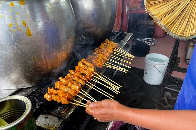 Kuala Lumpur Food Tour - Kampung Baru: stilt houses, tea cakes, durian, and Nasi Lemak