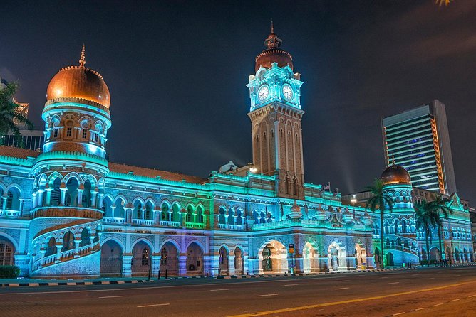 Private Kuala Lumpur City Tour With Petronas Tower & Local Dinner - Dataran Merdeka after dark: a quick photo angle with architecture contrast